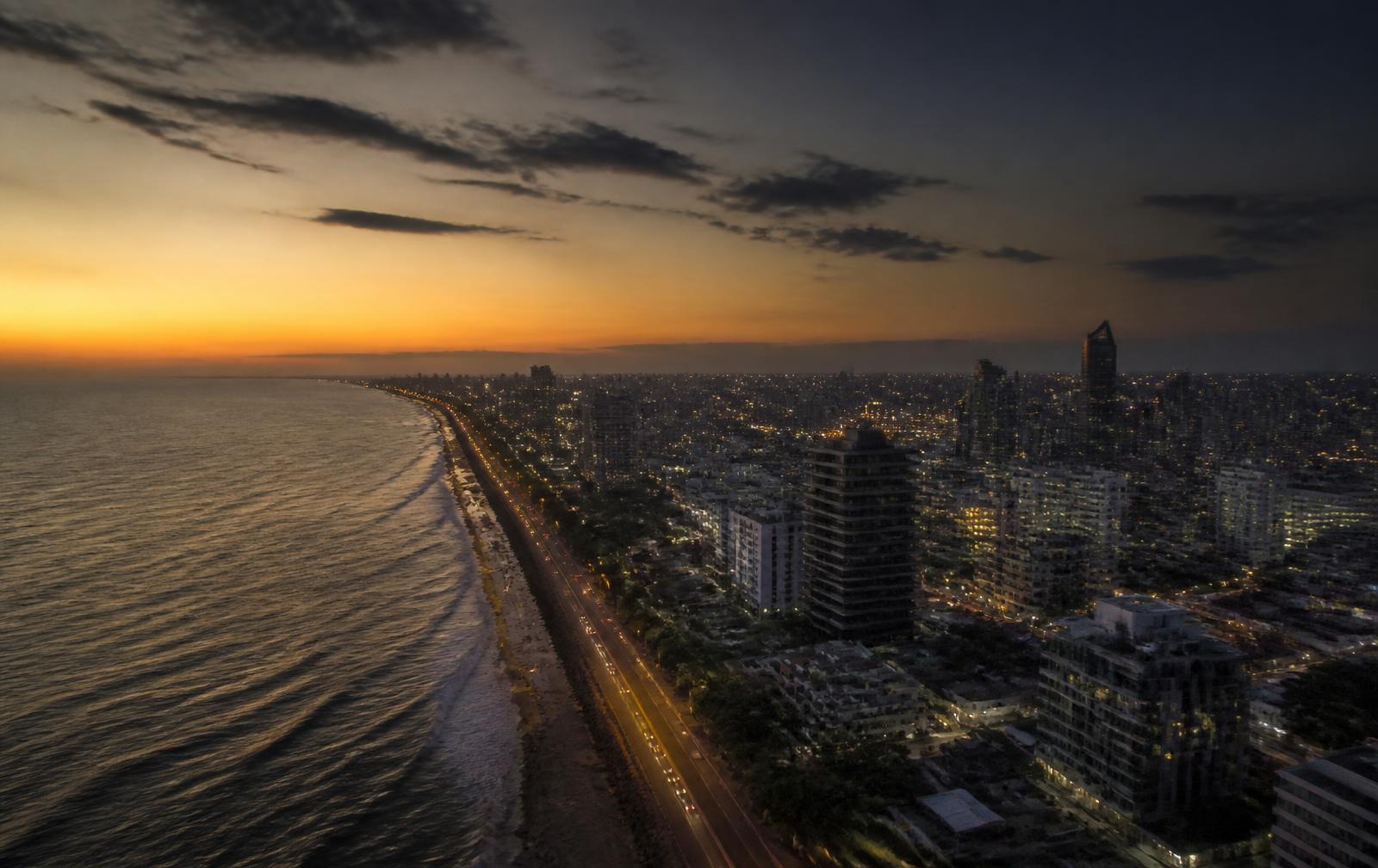 Aerial view of the Accra coastline at dusk